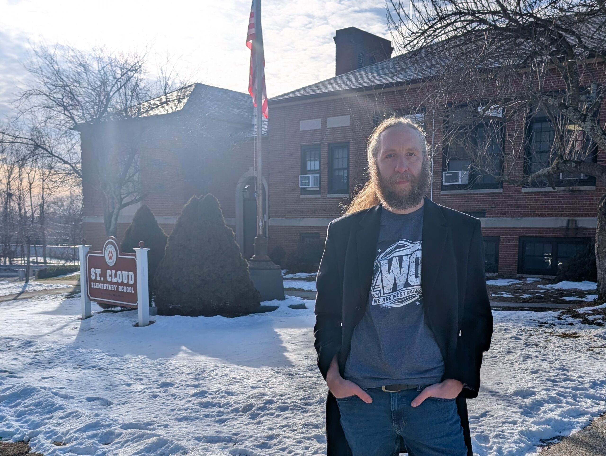 Brian Rock, candidate for Mayor of West Orange, standing in front of St. Cloud Elementary School.