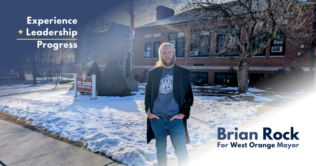 Brian Rock standing in front of St. Cloud Elementary School in West Orange, with the labels "Brian For for West Orange Mayor" and "Experience + Leadership = Progress."